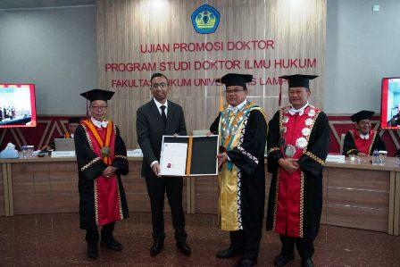 FH Unila Gelar Ujian Terbuka Sidang Promosi Doktor Artha Ario Putranto